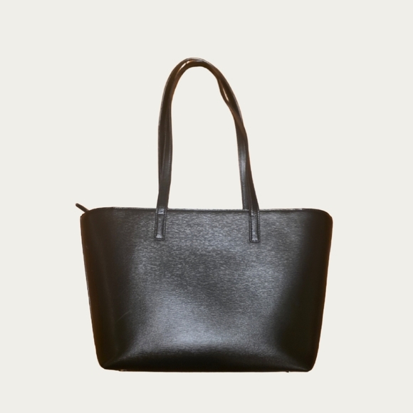 DKNY Bryant Medium Zippered Tote Bag in black leather with gold-tone hardware.  - Picture 9 of 17